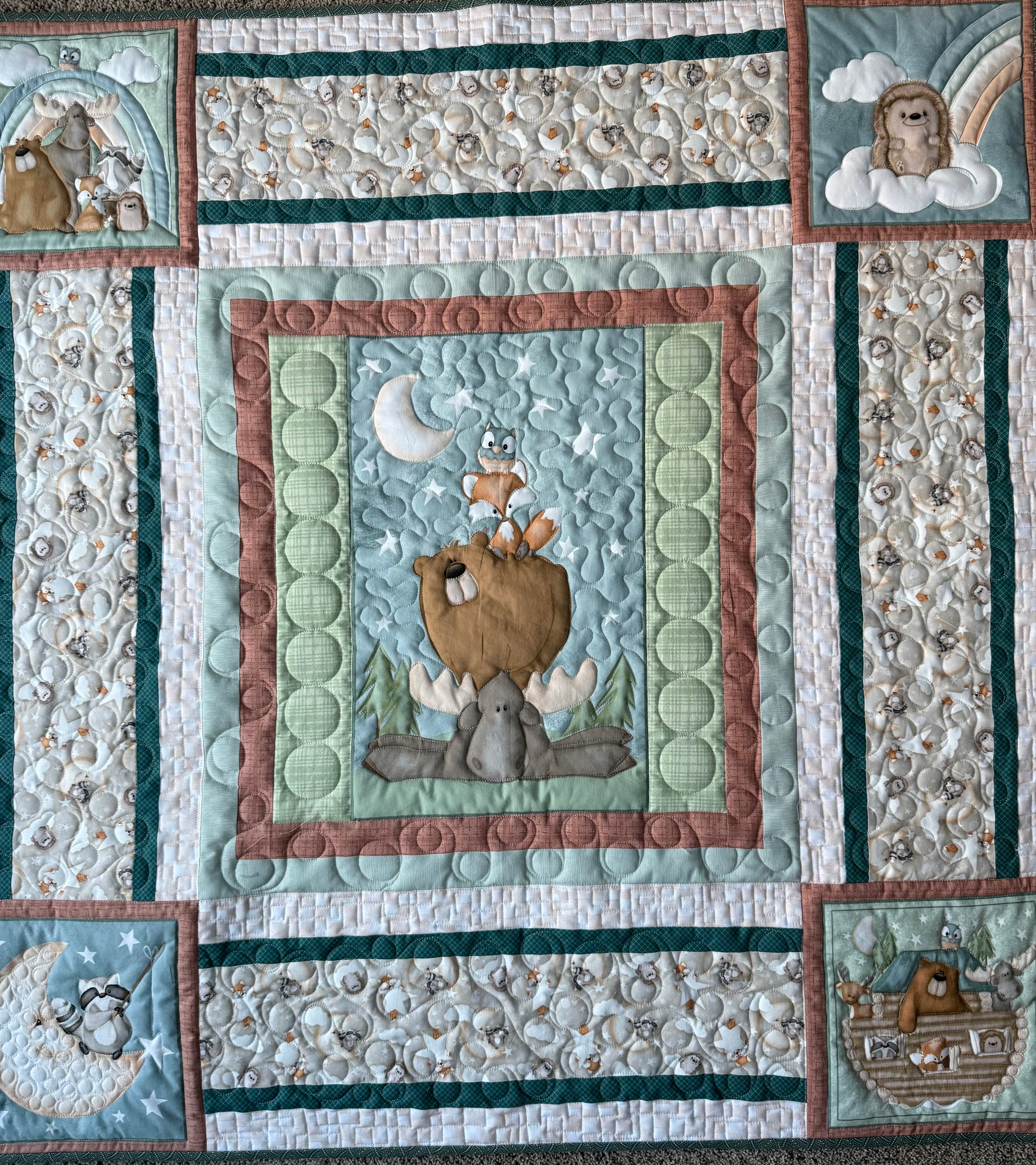 Handmade forest animal baby quilt with woodland theme, soft cotton, by Oak & Thread Quilts