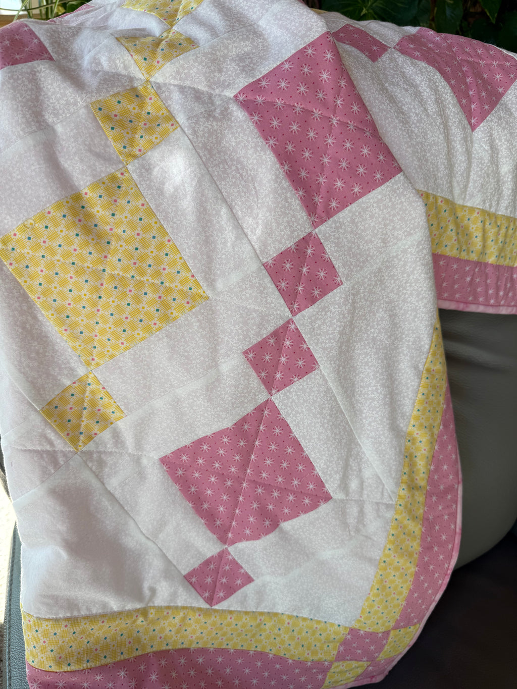 Handmade pink and yellow baby quilt in soft cotton, perfect baby gift, by Oak & Thread Quilts