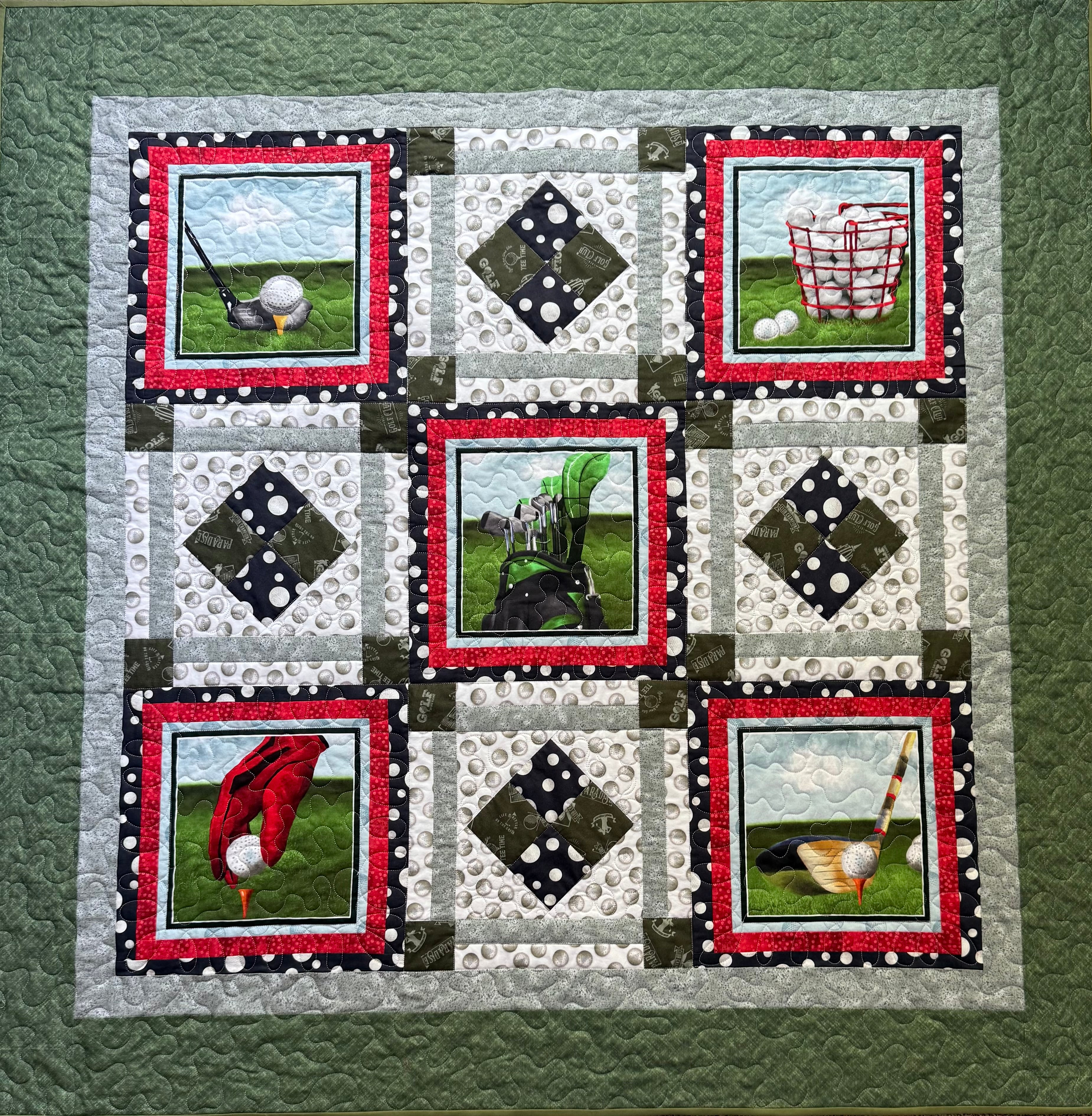 Close-up of golf-themed fabric squares in handmade lap quilt
