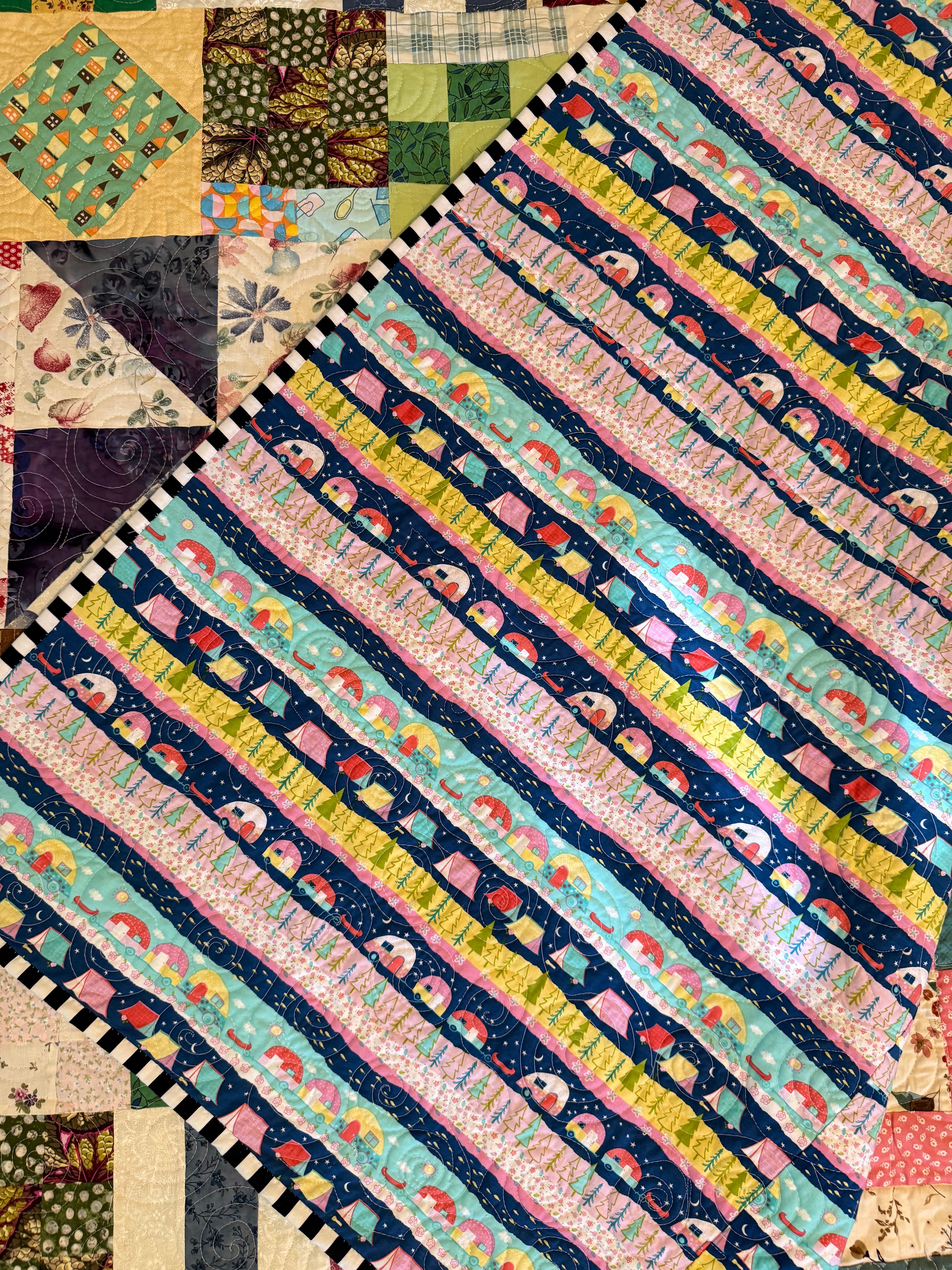 Bohemian scrap quilt folded to show texture and backing