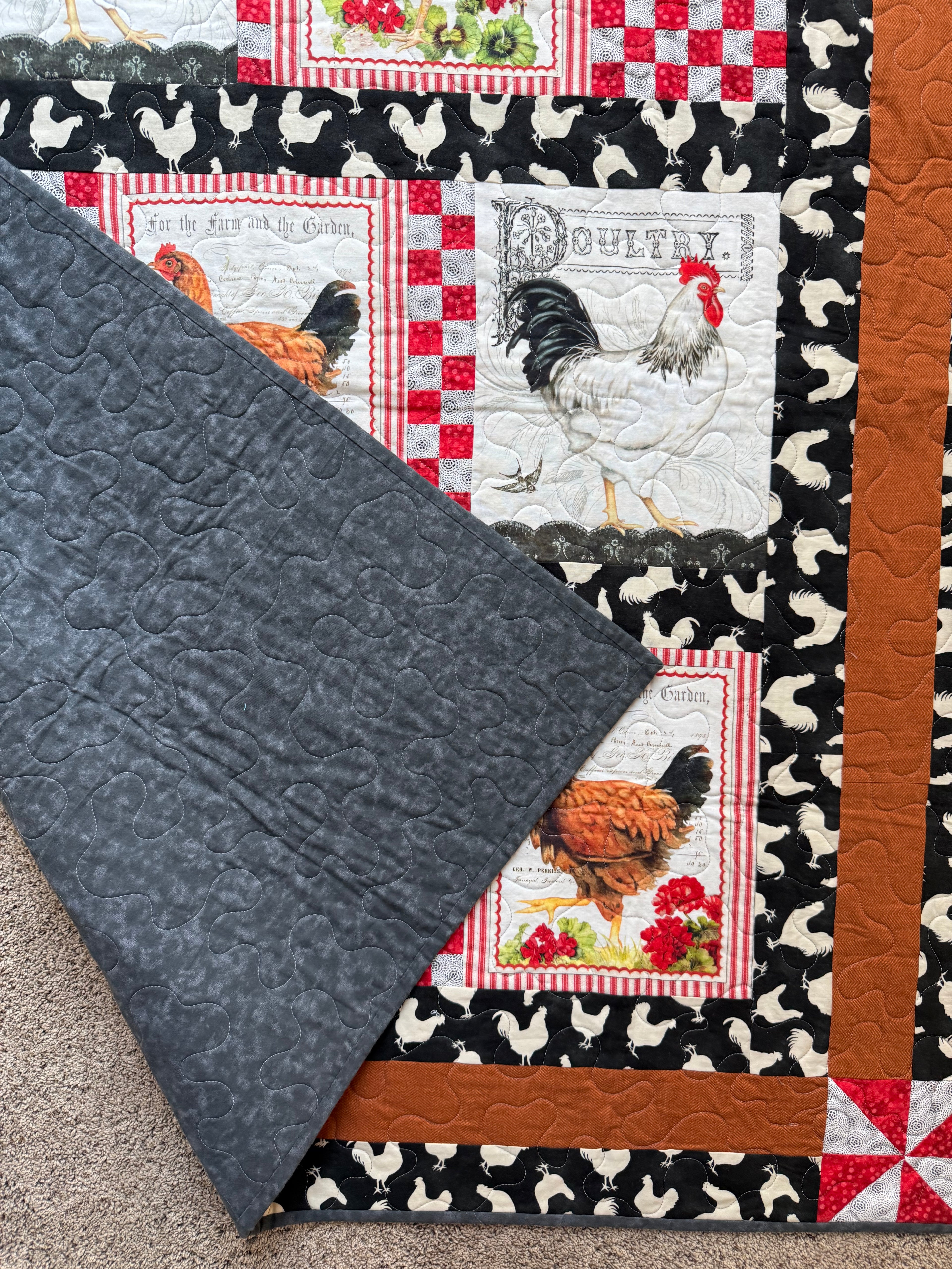 Handmade Chicken quilt showing gray backing fabric