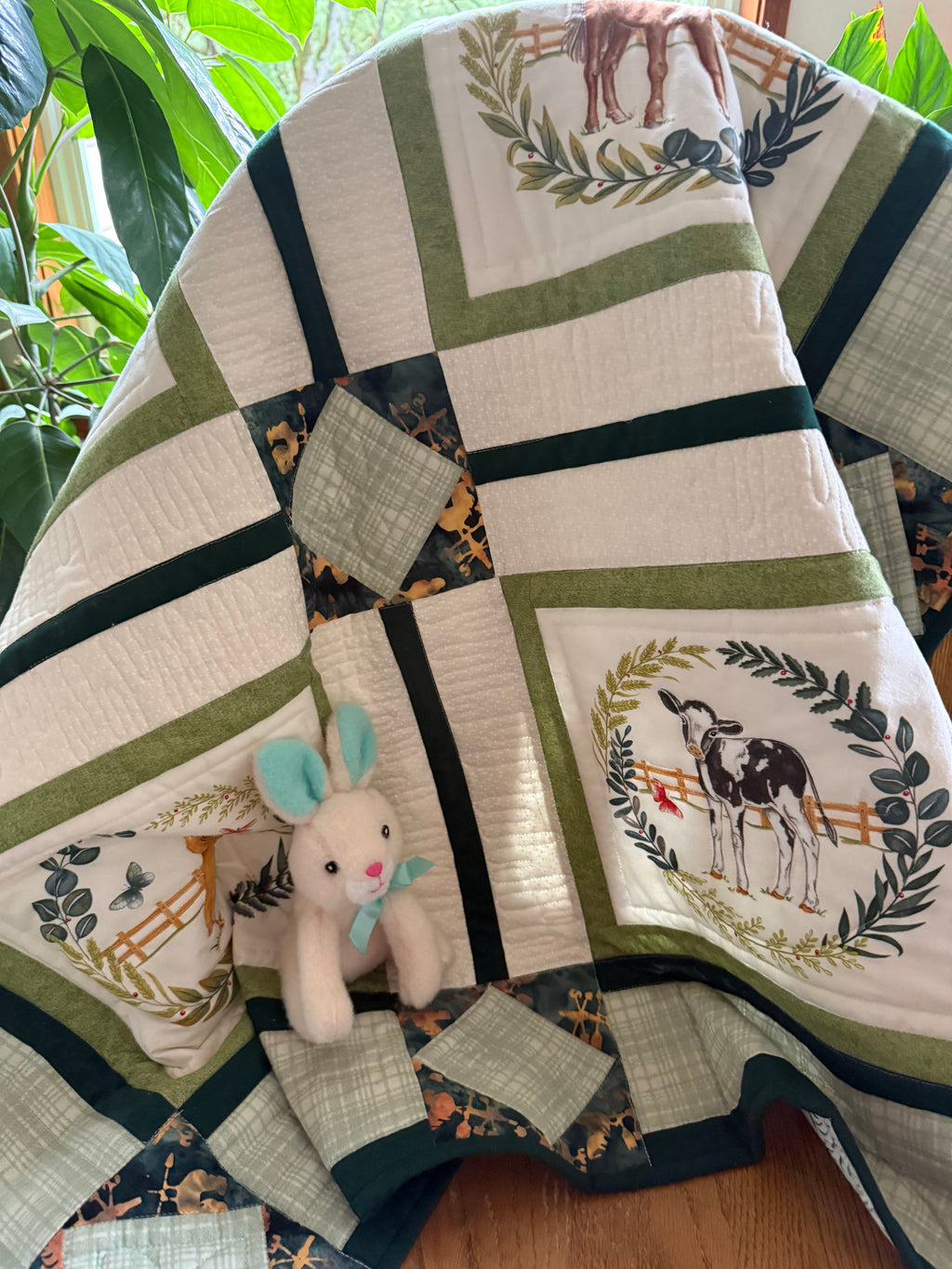 Handmade farm animal quilt in green