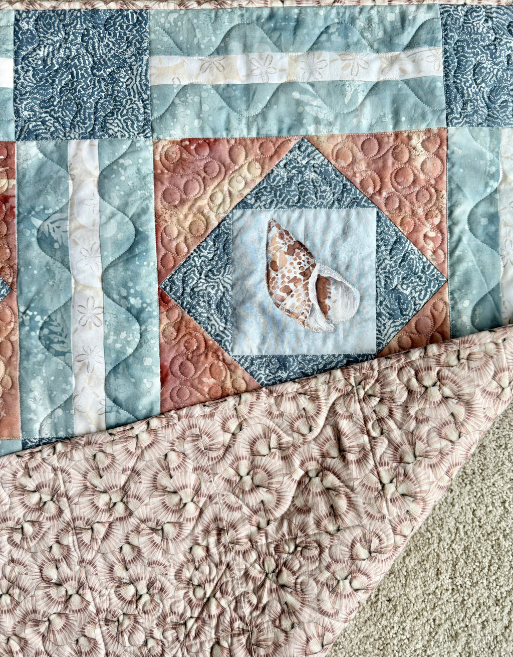 Handmade ocean theme quilt with sea shell backing fabric 