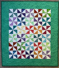Handmade Batik Pinwheel Baby Quilt
