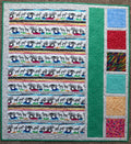 Handmade safari baby quilt with bright patchwork design 