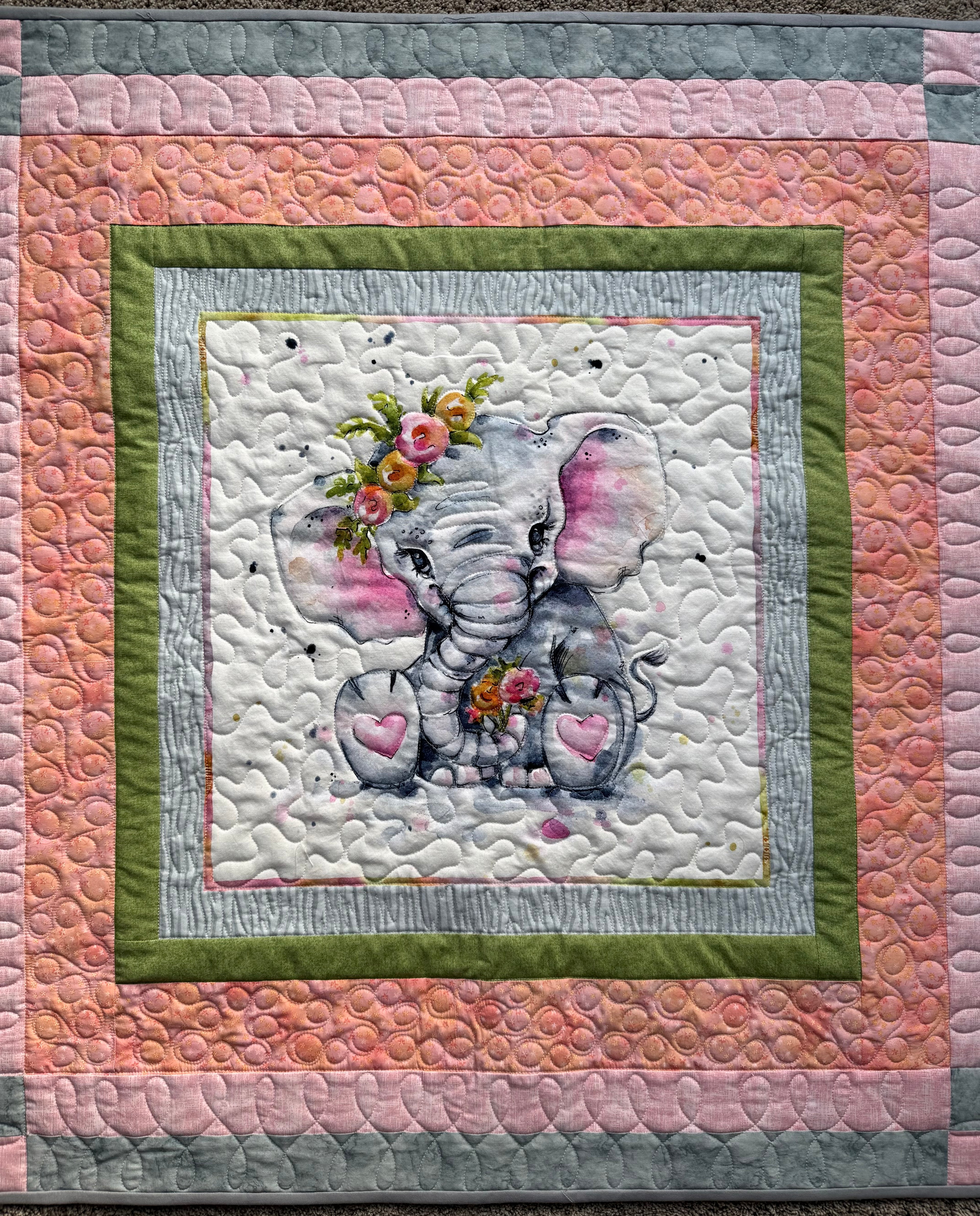Handmade elephant baby quilt with borders in pink, peach and gray
