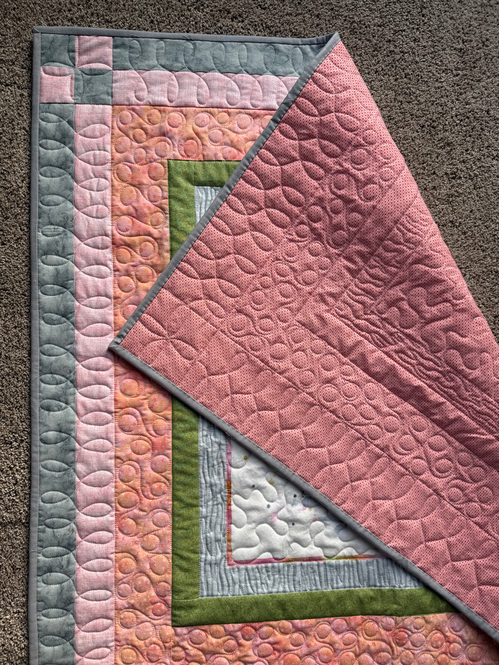 Handmade baby quilt with elephant panel and pink dotted backing 